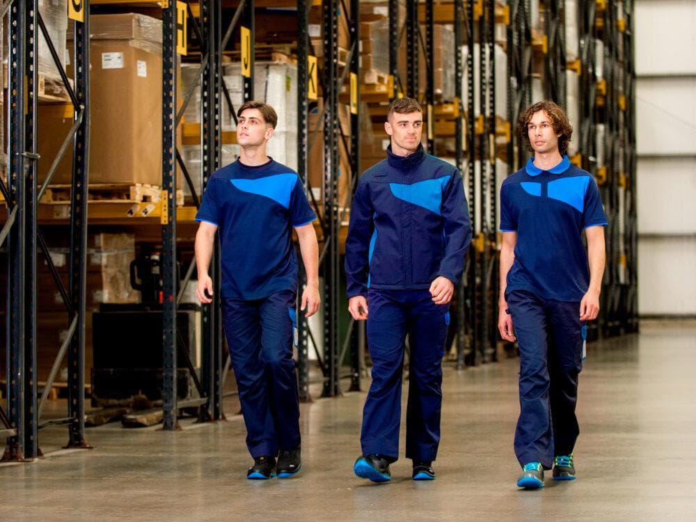 Maintenance staff wearing practical work uniforms